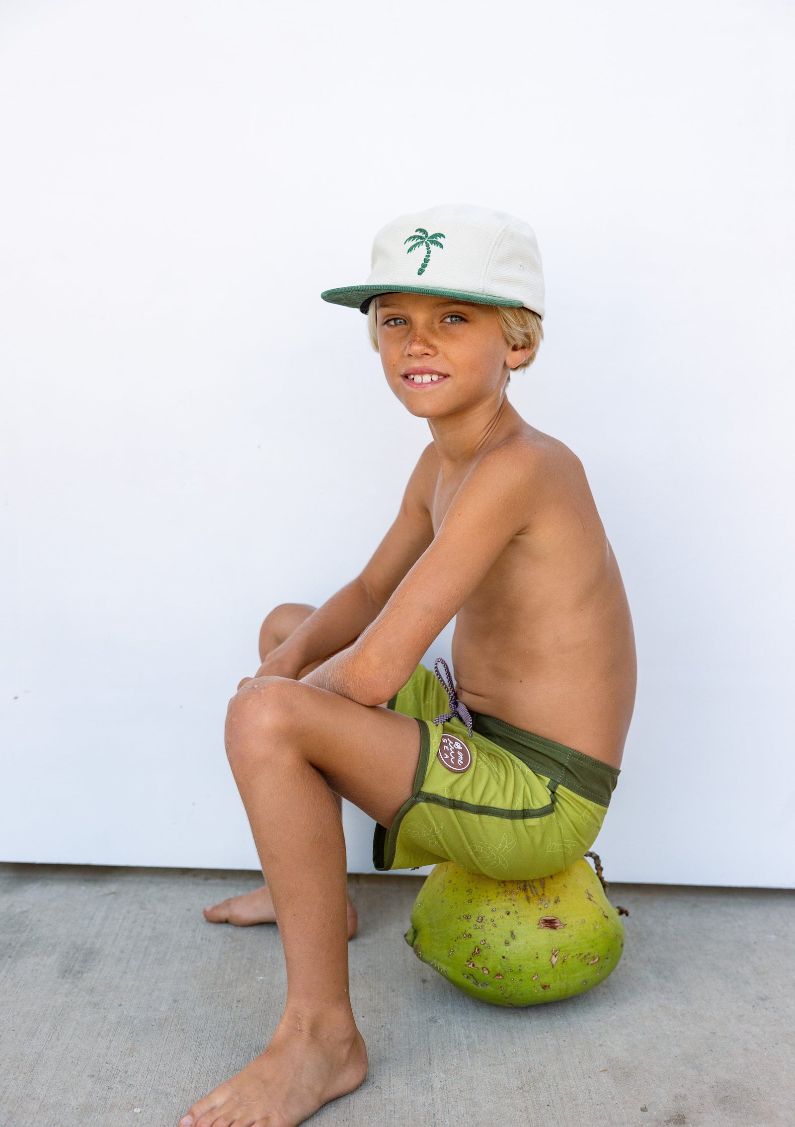 Kid’s Retro Boardshorts in Green Palm Trees