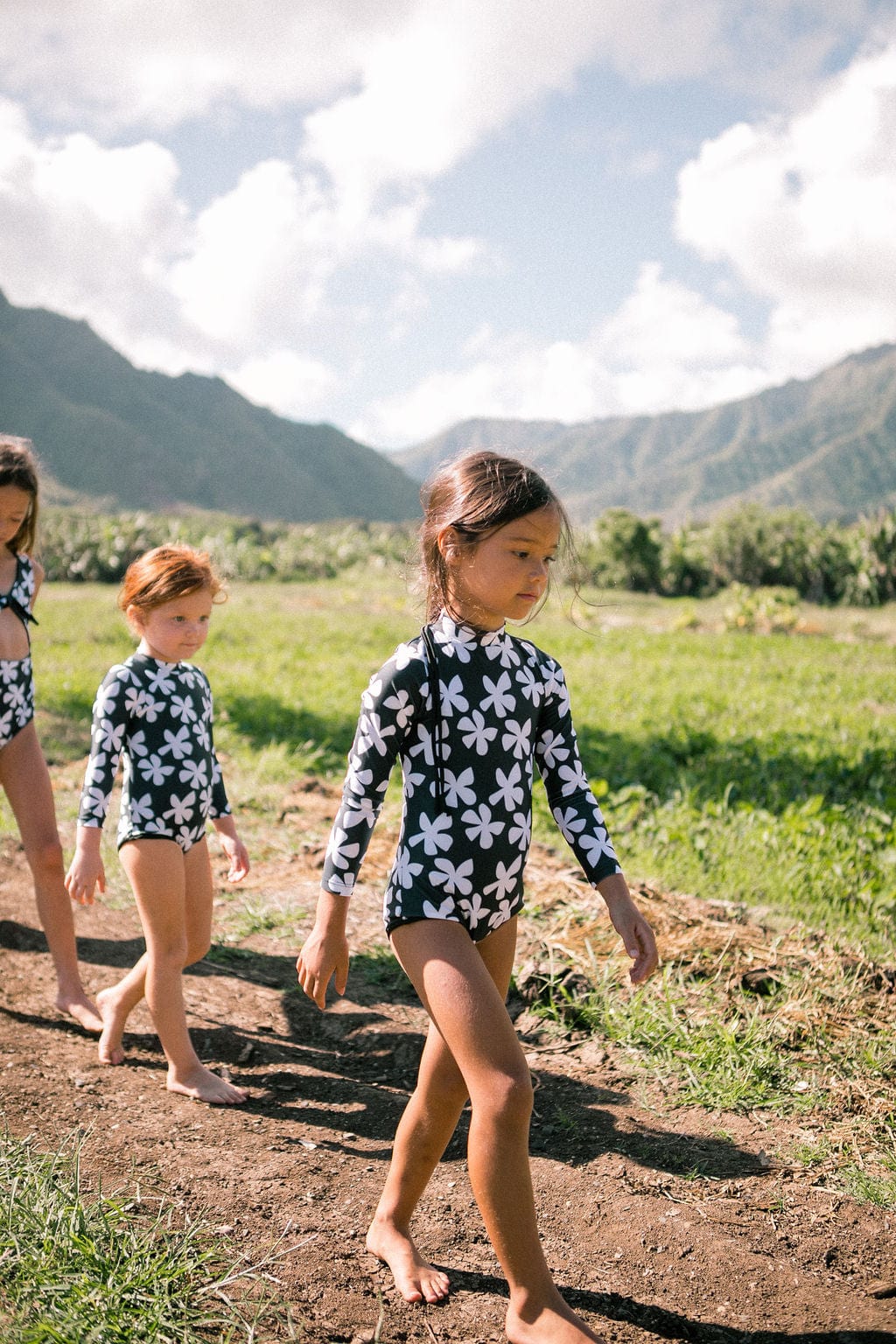 Girl's Long Sleeve Zip Up in Black Plumeria